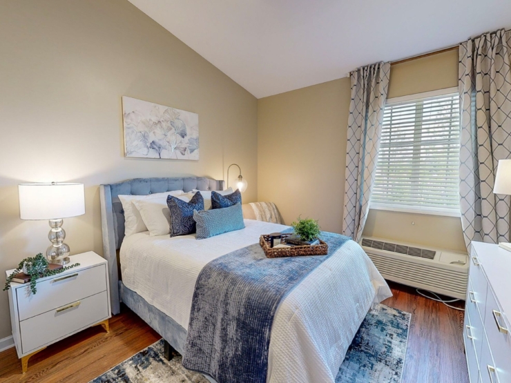 A welcoming bedroom filled with light, featuring soft decor, inviting textures, and a sense of tranquility.