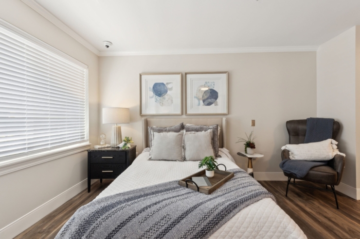 Bright, inviting room with comfortable furnishings, promoting a serene and welcoming atmosphere.