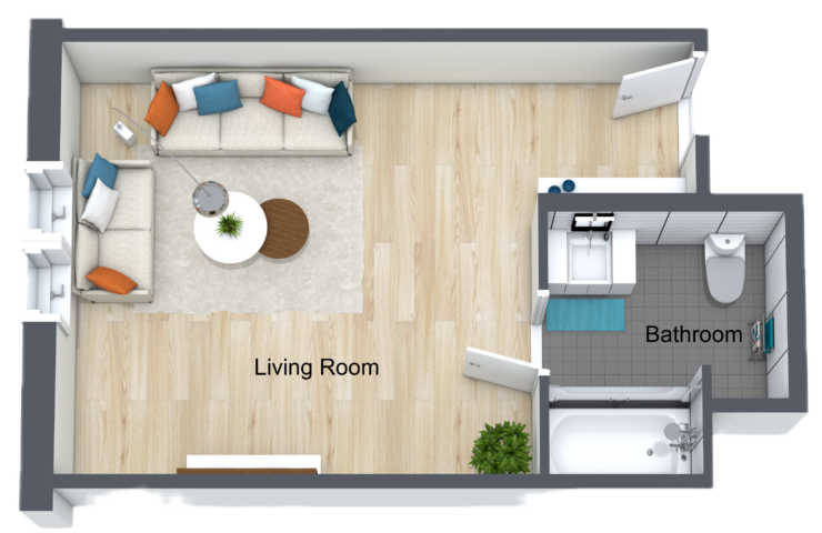Inviting living room with ample seating, warm lighting, and easy access to a private bathroom.
