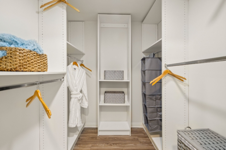 Inviting and organized, this serene closet setting offers comfort and personal space for residents.