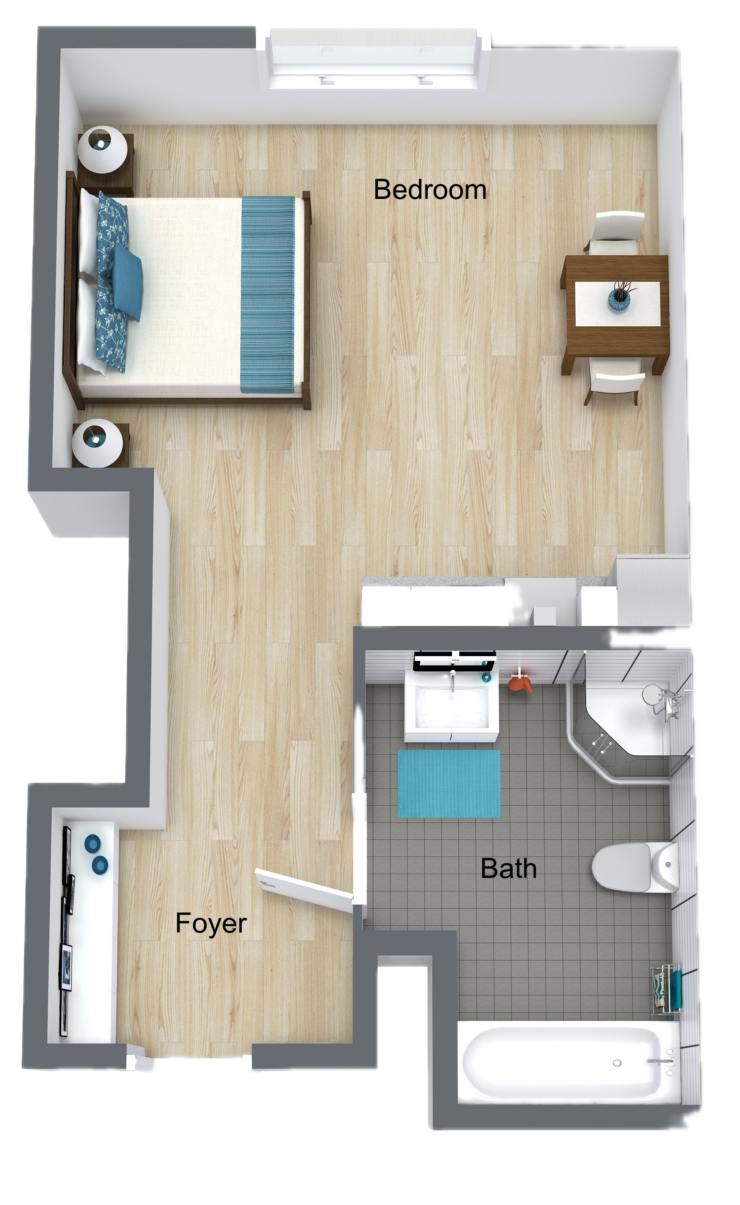 A bright, inviting living space with warm wood flooring, designed for comfort and community.