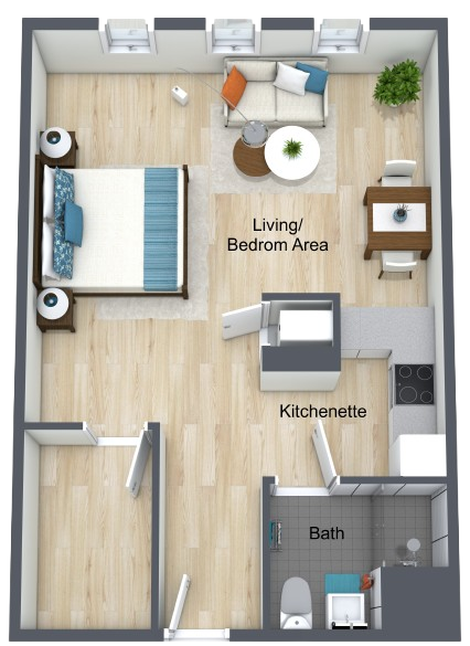 Open studio layout with kitchen, bath, and spacious living area designed for comfort and ease.