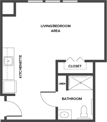 A welcoming living space designed for comfort and community, featuring a kitchenette and ample storage.