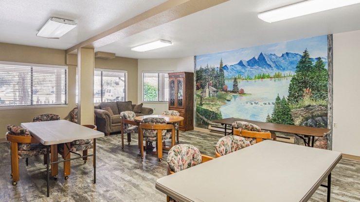 Craft room with elegant decor and inviting seating, fostering community connections.