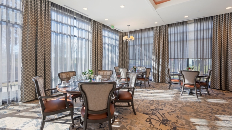 Bright and cozy dining area, inviting warmth and community with elegant decor and natural light.