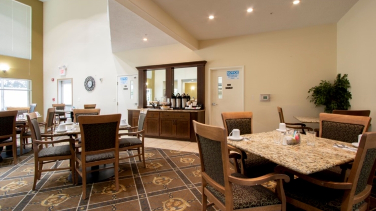 Bright and inviting dining area, perfect for community gatherings and shared meals.