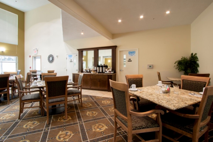 Bright and inviting dining area, perfect for community gatherings and shared meals.
