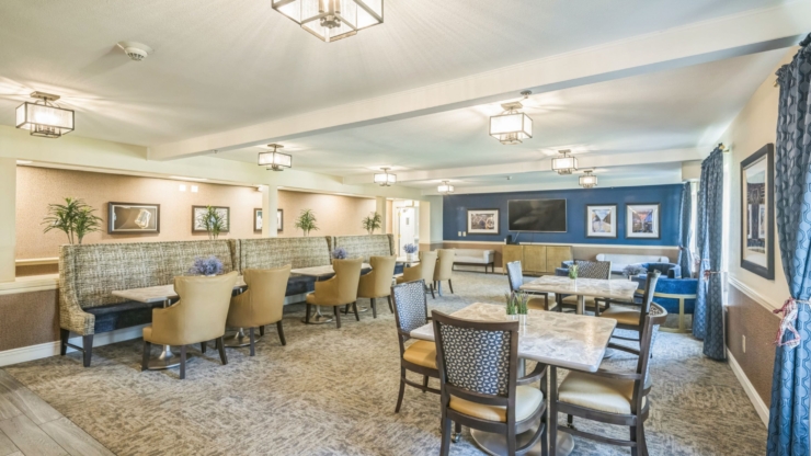 Inviting lounge space with comfortable seating, warm lighting, and a vibrant community atmosphere.