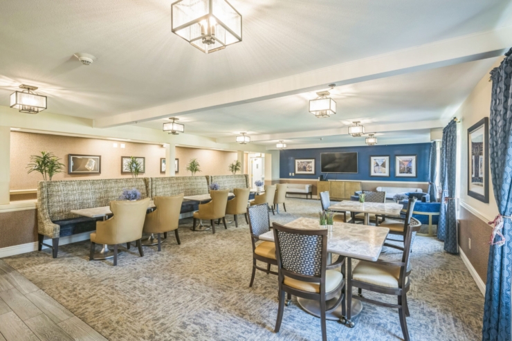 Inviting lounge space with comfortable seating, warm lighting, and a vibrant community atmosphere.