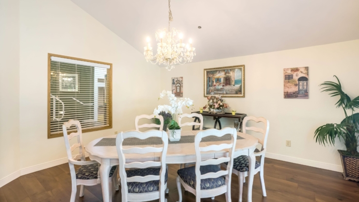 A bright dining area with elegant decor invites warm gatherings and shared moments among residents.