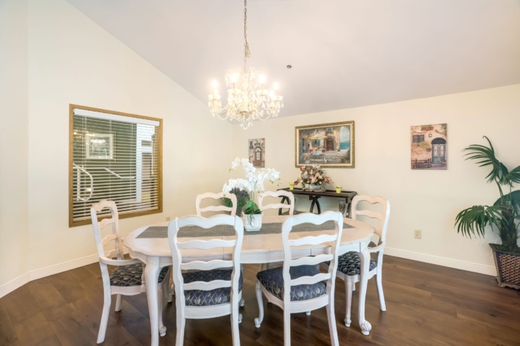 A bright dining area with elegant decor invites warm gatherings and shared moments among residents.