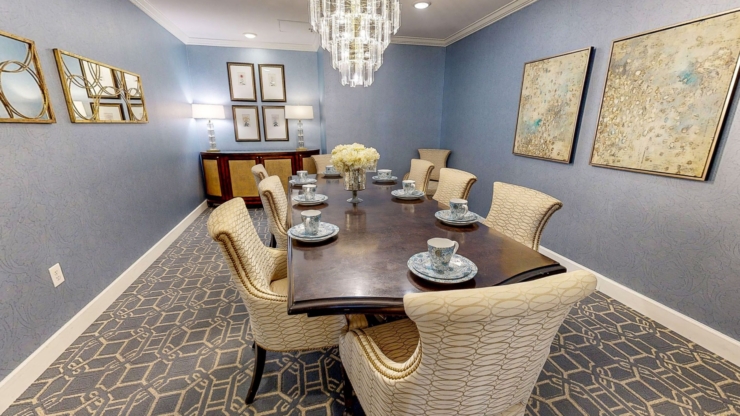 A beautifully set dining area, inviting warmth and community, perfect for shared moments and gatherings.