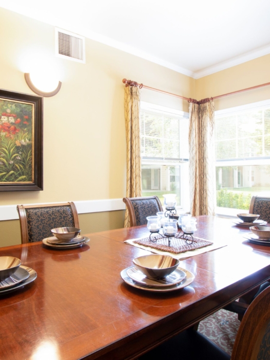 A warm dining space filled with natural light, inviting community gatherings and shared meals.