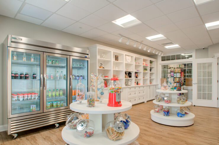 Bright, welcoming shop area with snacks, beverages, and gifts fostering community and comfort.