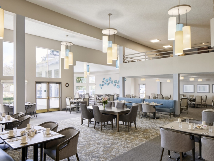 Bright and welcoming dining space fosters community and comfort, perfect for shared moments.