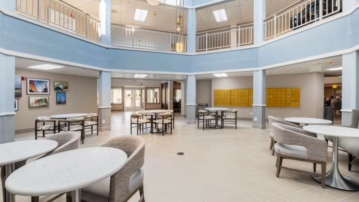 Bright, inviting space with comfortable seating, fostering community and connection among residents.