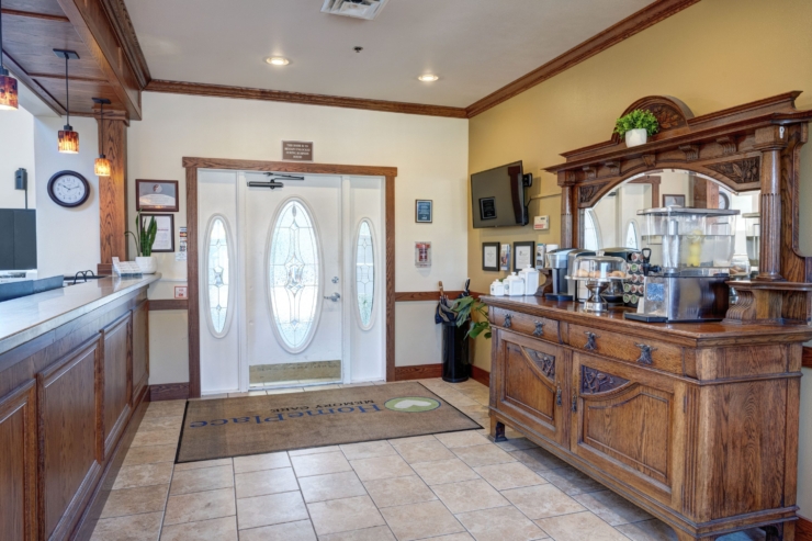 A welcoming reception area with warm wood accents, inviting decor, and a friendly atmosphere.
