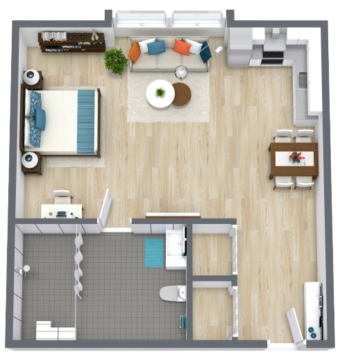 Spacious and inviting, this room features warm wood flooring and ample natural light, perfect for comfort and connection.