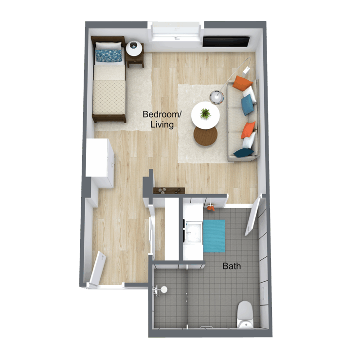 A cozy, inviting space with warm wood flooring, perfect for relaxation and community gatherings.