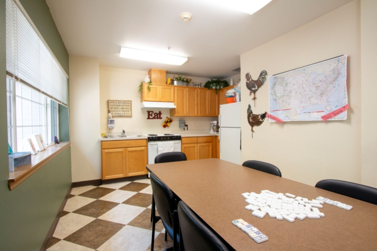 A cozy kitchen space inviting connection, with a warm atmosphere perfect for gatherings and games.
