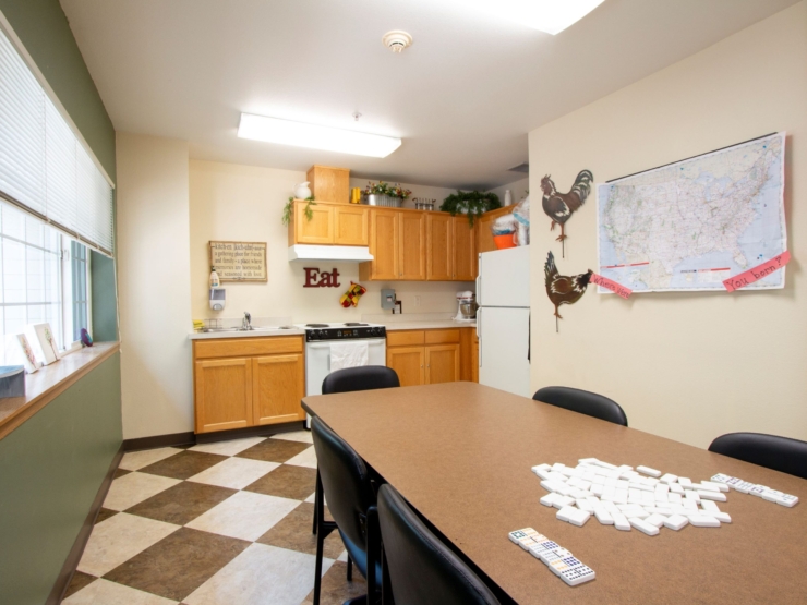 A cozy kitchen space inviting connection, with a warm atmosphere perfect for gatherings and games.