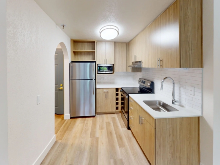 Bright and inviting kitchen space, designed for comfort and community, perfect for sharing meals.