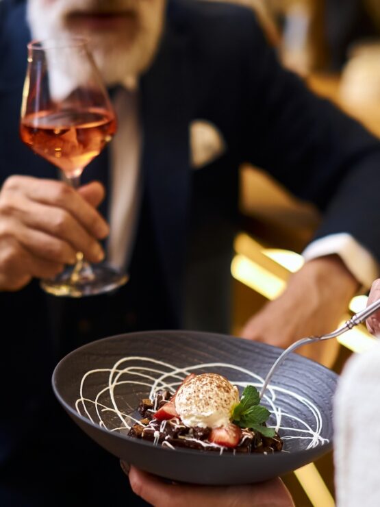 Enjoying a delightful meal together, this scene radiates warmth and community spirit.