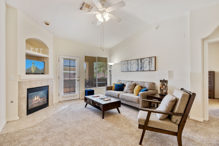 A cozy living space with warm tones, inviting furniture, and natural light, perfect for community gatherings.