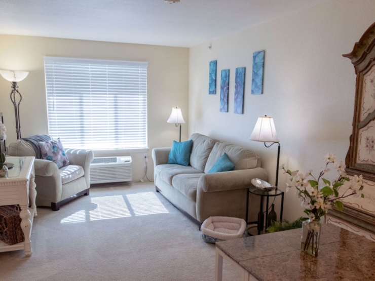 Bright and inviting, this living space fosters warmth and community, perfect for relaxation and connection.