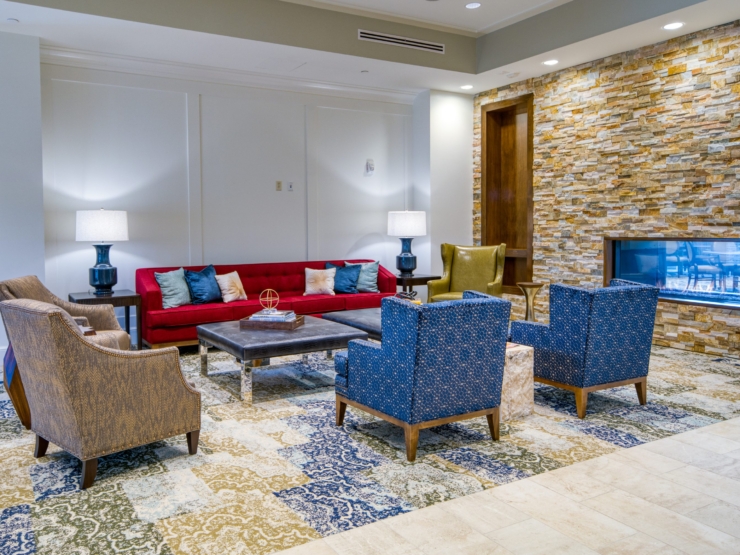 Warm and inviting, this lounge features comfortable seating and a serene atmosphere for community connection.