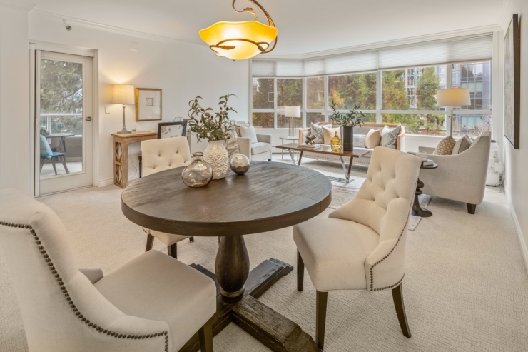 A bright, inviting gathering space featuring elegant furnishings and warm natural light, perfect for community connections.