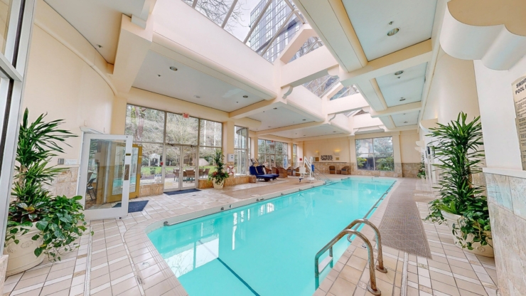 Bright and inviting, this serene indoor pool area fosters relaxation and community spirit.
