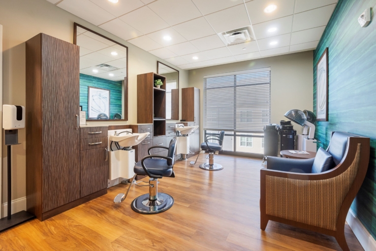 A bright, welcoming salon space designed for relaxation and community, perfect for pampering residents.