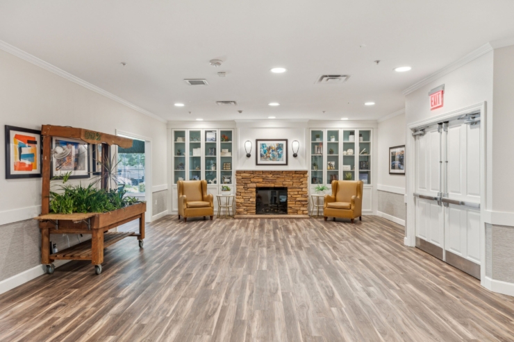 An inviting area with comfortable seating, warm lighting, and vibrant decor fosters a sense of community.