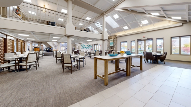 Bright, inviting dining area fosters community and warmth, perfect for shared moments and connections.