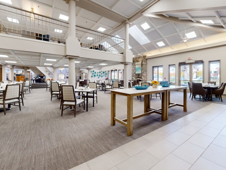 Bright, inviting dining area fosters community and warmth, perfect for shared moments and connections.