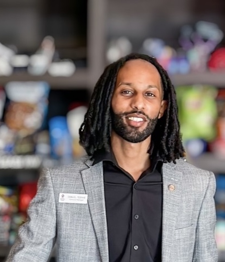 Warm smiles and a welcoming atmosphere highlight a community-focused space, fostering connection and comfort.
