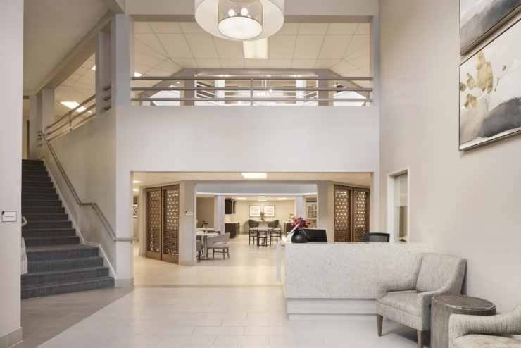 A welcoming lobby with cozy seating, bright spaces, and a sense of community and comfort.