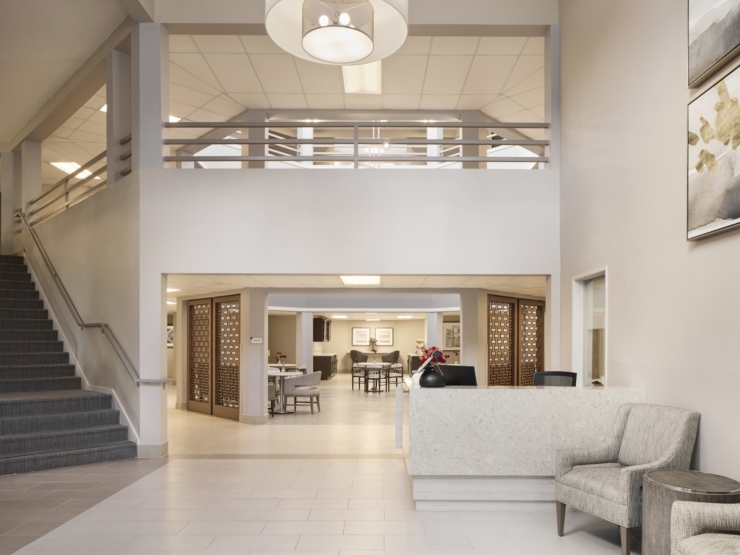A welcoming lobby with cozy seating, bright spaces, and a sense of community and comfort.
