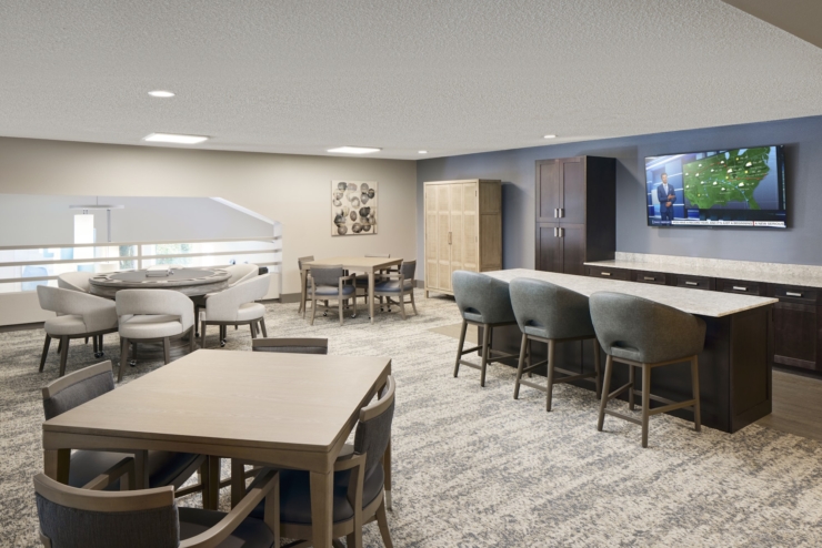 A cozy communal space with inviting seating, perfect for relaxation and connection among residents.