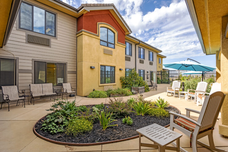 Bright and inviting outdoor seating area, perfect for relaxation and community gatherings.