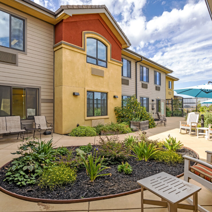 Bright and inviting outdoor seating area, perfect for relaxation and community gatherings.