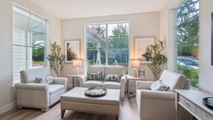 A bright, inviting lounge with comfortable seating, perfect for community gatherings and relaxation.