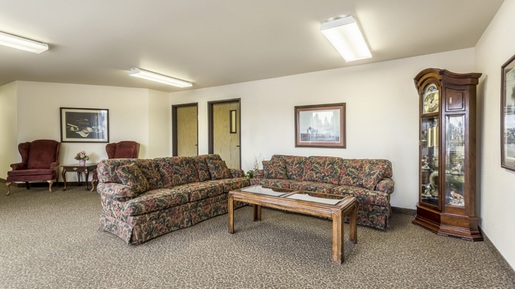 A welcoming lounge with comfortable seating, inviting warmth, and shared moments of connection.
