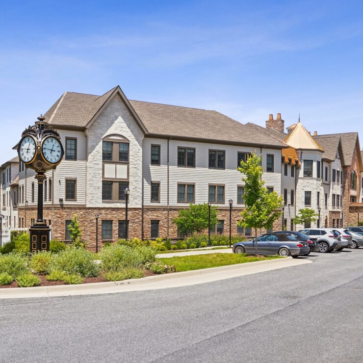 A welcoming community with beautiful architecture, lush greenery, and a friendly atmosphere.