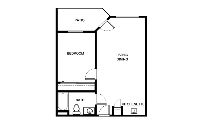 A well-designed living space that fosters comfort and community, featuring a peaceful patio and cozy kitchenette.