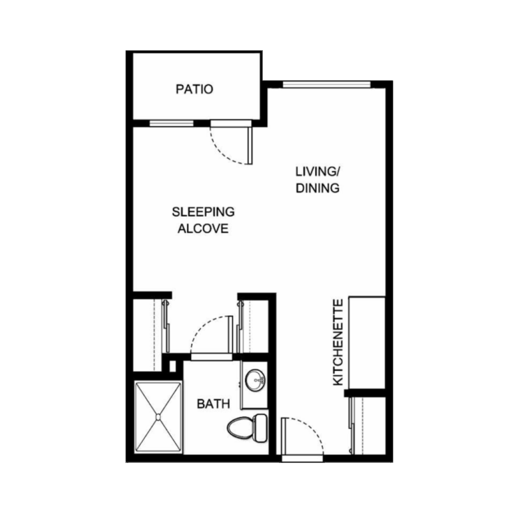 Spacious layout with a welcoming living area, kitchenette, and private patio for relaxation.