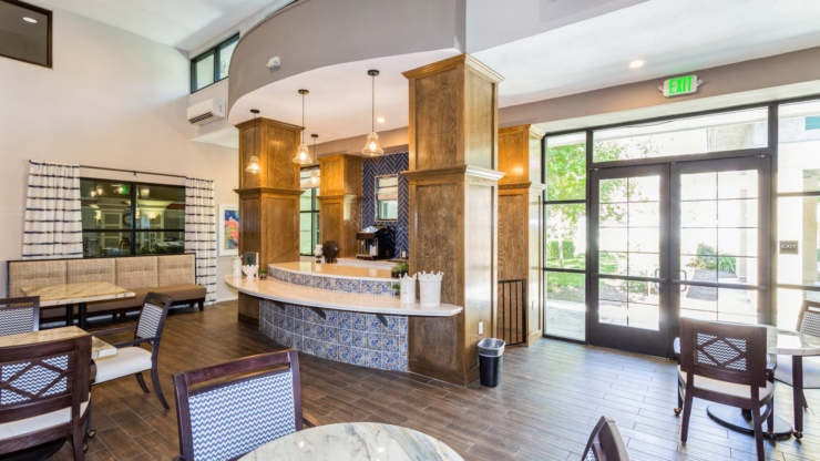 Bright, inviting common area with cozy seating and natural light, perfect for community gatherings.