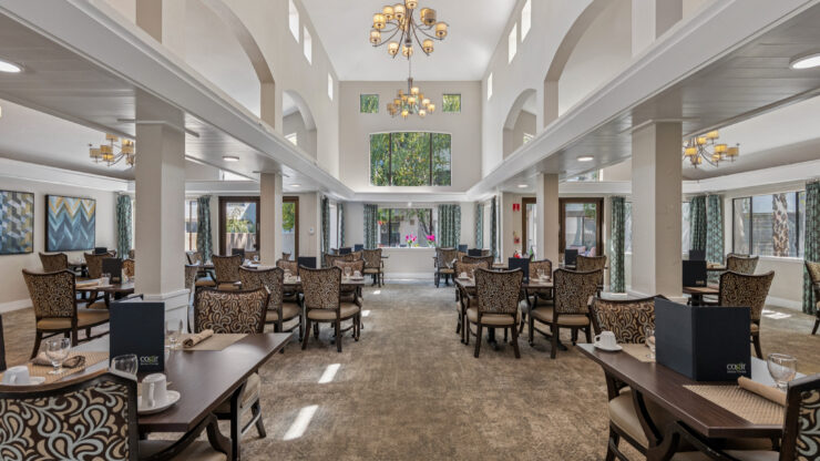 Bright and inviting dining area fosters community and comfort, perfect for shared meals and connections.