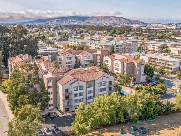 A welcoming community surrounded by lush greenery and scenic views, perfect for relaxed living.